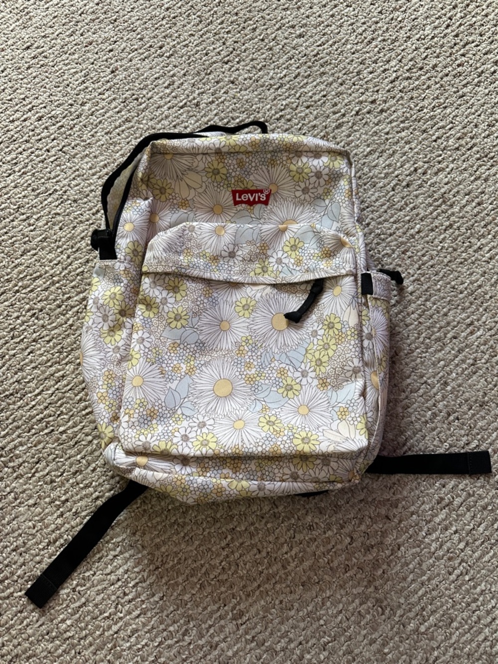 Levi's White Floral Canvas Backpack with Yellow and Black Details